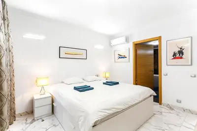 Cama o camas de una habitación en Luxury Penthouse Puerto de Mogan with great terrace and sea view
