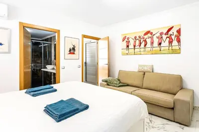 Zona de estar de Luxury Penthouse Puerto de Mogan with great terrace and sea view