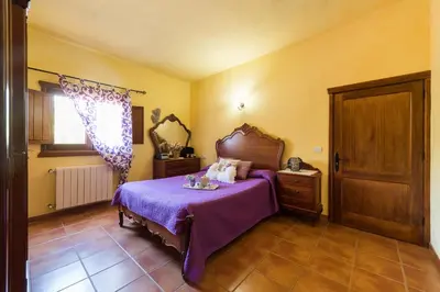 Cama o camas de una habitación en Naturacanaria - Flor de mundo