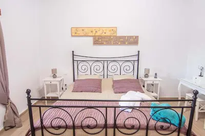 Cama o camas de una habitación en Casa Terpsicore