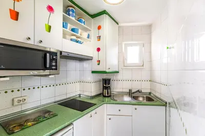 Una cocina o zona de cocina en Ático en primera linea Las Canteras