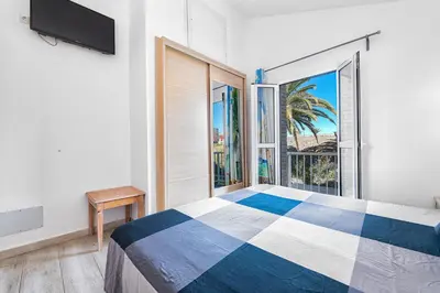Cama o camas de una habitación en BUNGALOW en CAMPO INTERNACIONAL