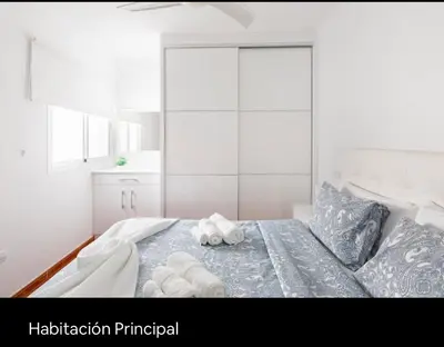 Cama o camas de una habitación en El Balcón De Arinaga