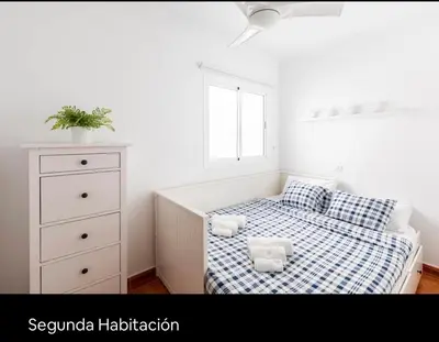 Cama o camas de una habitación en El Balcón De Arinaga