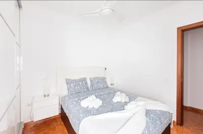 Cama o camas de una habitación en El Balcón De Arinaga