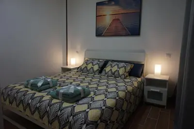 Cama o camas de una habitación en BRISAS DEL MAR APARTMENT, ONE STEP FROM THE SEA.