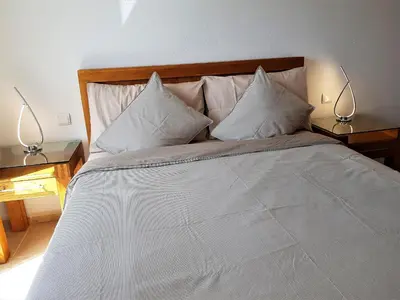 Cama o camas de una habitación en Su Eminencia - 2 bedrooms 5 star Playa Del Cura