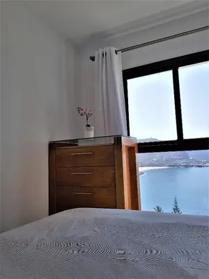 Cama o camas de una habitación en Su Eminencia - 2 bedrooms 5 star Playa Del Cura