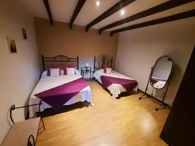 Cama o camas de una habitación en Casa Cueva Villa Aday