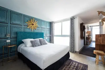 Cama o camas de una habitación en Apartamentos Vegueta