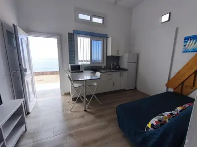 Una televisión o centro de entretenimiento en Apartamento Salinas