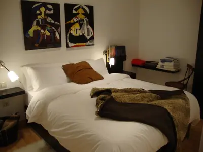 Cama o camas de una habitación en Triana Teatro VV