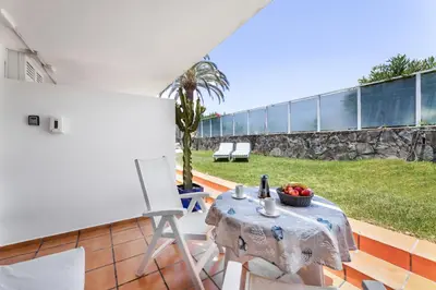 Zona de estar de Apartamentos El Capricho