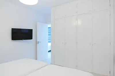Una televisión o centro de entretenimiento en Villas Pasito Blanco