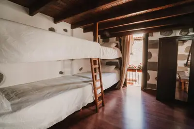Cama o camas de una habitación en Rural Suite Santiago de Tunte