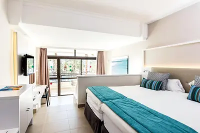 Cama o camas de una habitación en Grupotel Orquidea