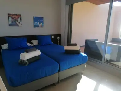 Cama o camas de una habitación en Villa Golfers 6