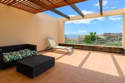 Un balcón o terraza de Villa Golfers 6