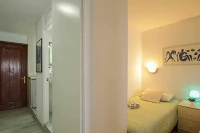 Cama o camas de una habitación en Ocean Front Apartment