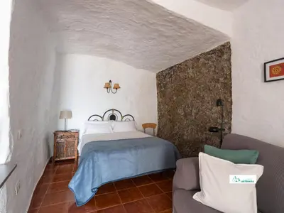 Cama o camas de una habitación en Living Artenara - CAVE HOUSE & TERRACE Adults Only