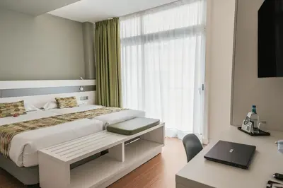 Cama o camas de una habitación en Hotel Aloe Canteras