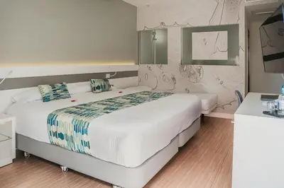 Cama o camas de una habitación en Hotel Aloe Canteras