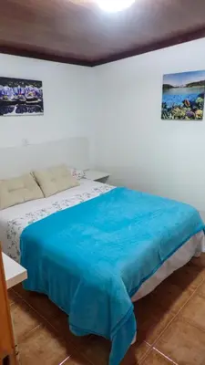 Cama o camas de una habitación en Las Casillas de Tasarte by Villas Rivero