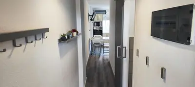 Una televisión o centro de entretenimiento en Apartamento Relax Dunas