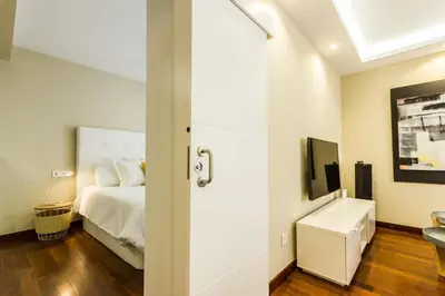 Cama o camas de una habitación en Home Suite Home Gran Canaria