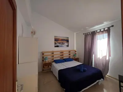 Cama o camas de una habitación en La Casa Sahi