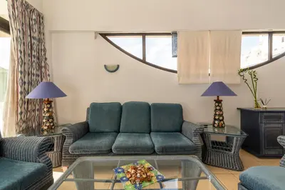 Zona de estar de Sunshine Beach Villas