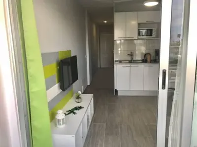 Una cocina o zona de cocina en Playa del Ingles terrace pool View 207