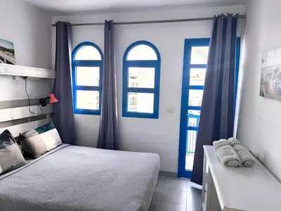 Cama o camas de una habitación en Amazing bungalow with wifi and terrace