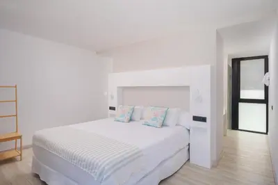 Cama o camas de una habitación en The One Luxury Apartments
