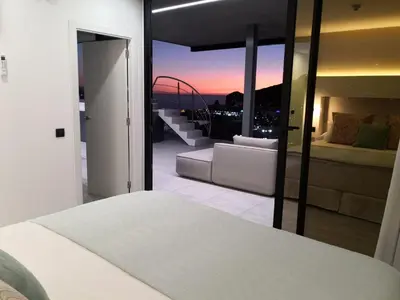 Cama o camas de una habitación en The One Luxury Apartments