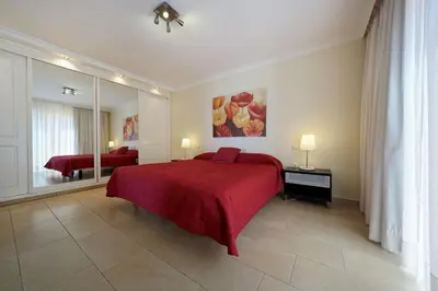 Cama o camas de una habitación en Bungalow Hibiscus San Agustin