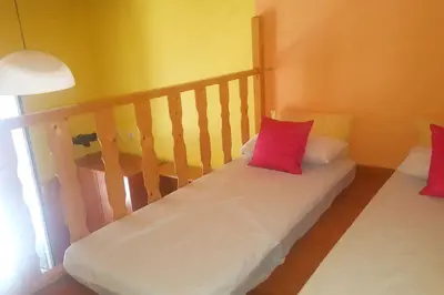 Cama o camas de una habitación en Casa Familiar CD