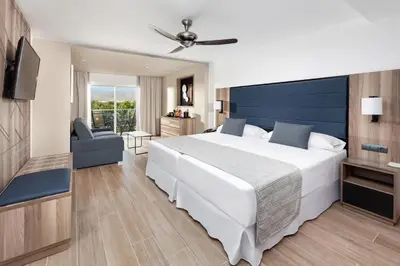 Cama o camas de una habitación en Hotel Riu Palace Oasis