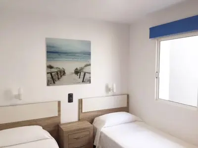 Cama o camas de una habitación en Duplex Playa del Cura beautiful ocean view