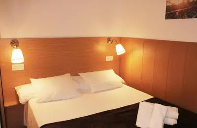 Cama o camas de una habitación en Island Friendly Holiday Home