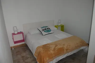 Cama o camas de una habitación en Apartamento Agaete beach 4B