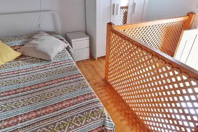 Cama o camas de una habitación en Cozy House 5 min from the Historic Center of Galdar