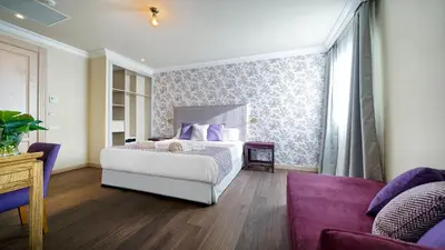 Cama o camas de una habitación en Hotel Emblemático Agáldar