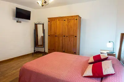 Cama o camas de una habitación en Las Cuevitas del Gamonal