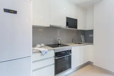 Una cocina o zona de cocina en Apartamento Las Canteras Beachway