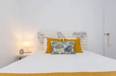 Cama o camas de una habitación en Cozy Apartment in Salinetas Beach.