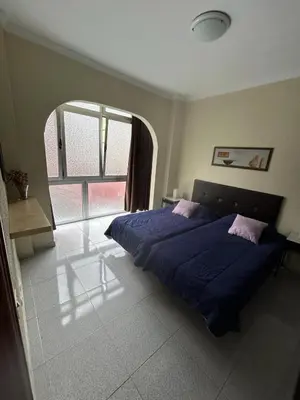 Cama o camas de una habitación en Apartamento céntrico y luminoso ALCARAVANERAS
