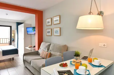 Zona de estar de Hotel Apartamento Bajamar