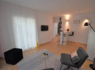 Una televisión o centro de entretenimiento en Villa Nestor