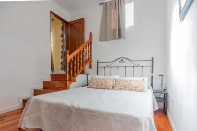 Cama o camas de una habitación en El Balcón del Sol